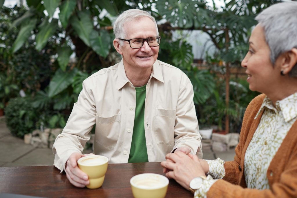 man and women having coffee